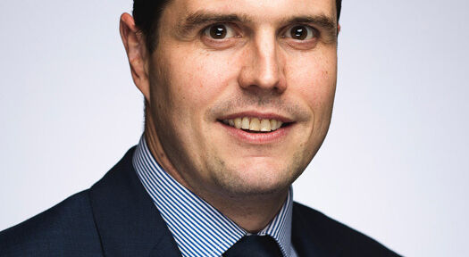 Axis appoints group commercial director