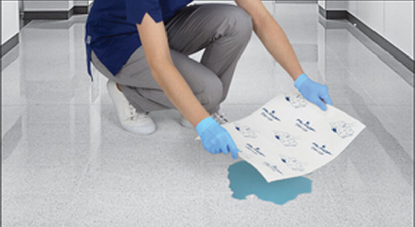 Super-absorbing pad dries spilt liquids in seconds